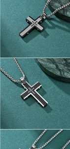 Detail of cross pendant necklace with checkerboard pattern and rhinestone insets