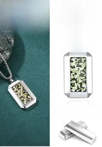 Detail of hexagonal camouflage dog tag pendant in polished stainless steel