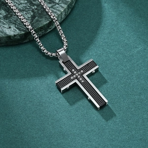 Polished stainless steel cross pendant with black grid texture and zircon stones on box chain