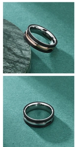 Detail of multi-layer men's ring with black mesh texture and polished silver and rose gold metal