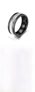 Detail view of 8mm stainless steel spinner ring with diamond pattern and rotatable band