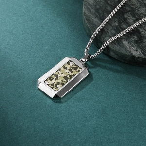 Men's stainless steel hexagonal camo pendant necklace with box chain on marble base