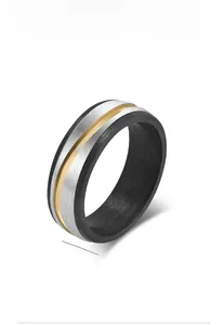 Detailed view of a 7mm titanium steel men's ring with carbon fiber and cz stone inlay