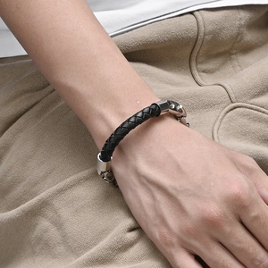 Men's leather braid bracelet with stainless steel accents in a coffee bean design style
