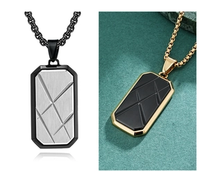 Detail view of rectangular tag pendants with asymmetric geometric faceted engraving on metal