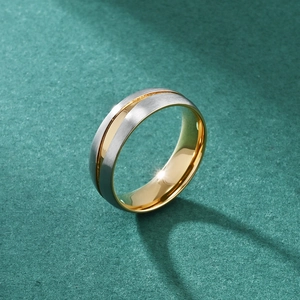 Men's two-tone brushed titanium steel ring with gold center groove and polished interior