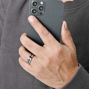 Men's titanium steel brushed ring with black groove line worn on hand with silver finish