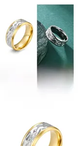 Macro detail of men's titanium steel ring with textured bark finish and gold accents