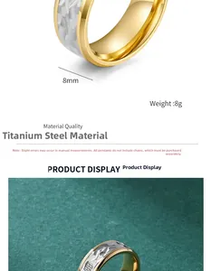 Macro detail of 8mm titanium steel ring with gold edges and silver hammered texture