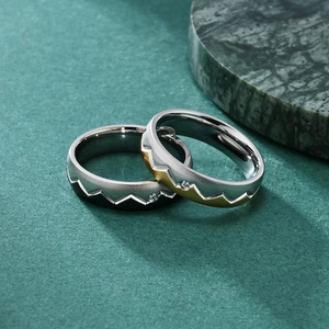 Couples' titanium steel rings with jagged mountain grooves and inlaid zircon stones