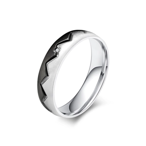 Titanium steel ring with creative zigzag pattern and centered zircon in 45-degree view