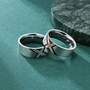 Titanium steel couple rings set with minimalist brushed finish and geometric cross pattern