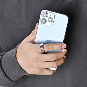 Polished silver bracket design titanium steel ring for men on hand with smartphone