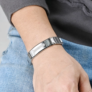 Men's silver stainless steel bracelet with double rows of CNC diamonds on a model