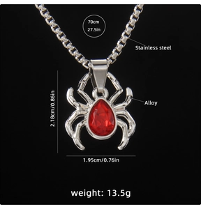 Detail of spider pendant with red teardrop stone on 70cm stainless steel box chain