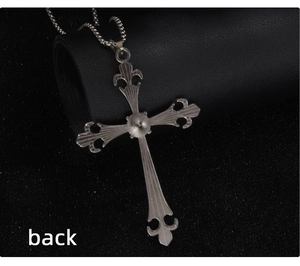 Back view of silver gothic cross pendant with iris details and beaded ball chain