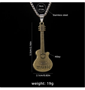 Detail view of retro bronze guitar pendant with music engraving and stainless steel chain