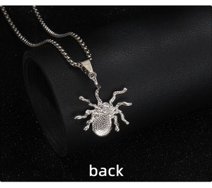 Detailed back view of punk spider pendant showing textured stainless steel and box chain