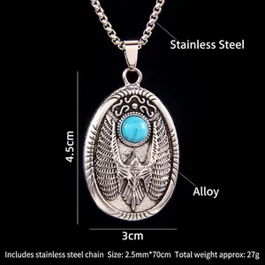 Collier vintage ailes d'aigle avec perle turquoise et chaîne croisée en acier