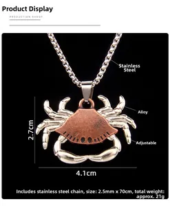 Detailed macro of vintage crab pendant with movable claws and 2.5mm stainless steel chain