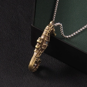 Vintage bronze seahorse pendant with hollow bone structure on a silver bead chain