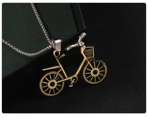 Macro shot of retro bicycle pendant featuring intricate cut-outs and vintage bronze finish