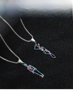 Macro detail of colorful skeleton pendants with iridescent plating on steel chains