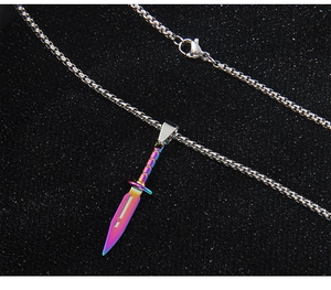 Detailed close-up of a colorful iridescent dagger pendant on a silver stainless steel chain