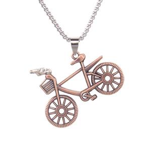 Vintage bronze bicycle pendant with silver stainless steel chain on white background