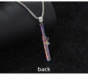 Macro view of the back side of a rainbow stainless steel sword pendant with dragon motifs