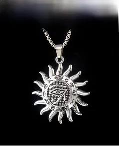 Detail of Eye of Horus solar pendant in antique silver finish with box chain