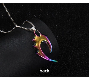 Macro shot of iridescent rainbow claw pendant back view on black leather display stand