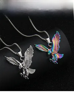 Detailed close-up of eagle pendant necklace with colorful gradient finish and fine carving