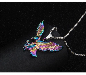 Macro shot of eagle pendant with iridescent colorful finish and stainless steel bead chain