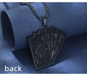 Close-up of black punk spade A poker cards pendant with embossed texture on chain