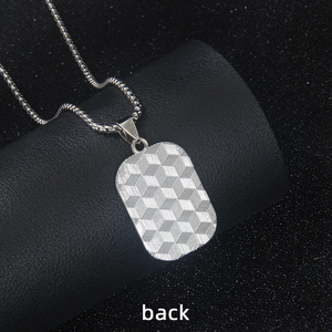 Silver stainless steel rectangular necklace pendant with geometric texture back view