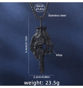 Detailed view of Gothic black skull hand middle finger pendant with 60cm stainless steel box chain
