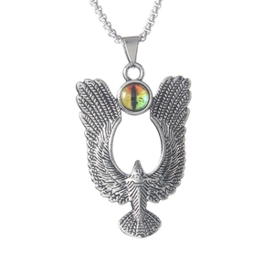 Men's vintage stainless steel eagle necklace with animal eye stone pendant on white background