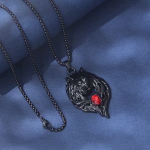 Black stainless steel wolf head necklace with a vibrant red gem pendant for men