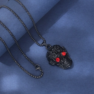 Collier hip hop avec pendentif tête de mort noir, yeux en strass rouges et chaîne box