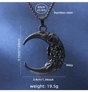 Macro shot of black punk moon and rose relief pendant with size measurements and specs