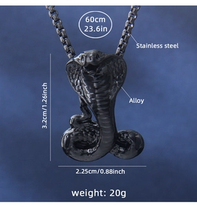Detail of cobra snake pendant with dimensions 3.2cm x 2.25cm and 60cm stainless steel chain