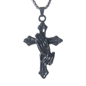 Vintage black stainless steel cross necklace featuring detailed praying hands relief pendant