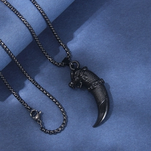 Punk black wolf tooth necklace with stainless steel pendant and tribal scale patterns