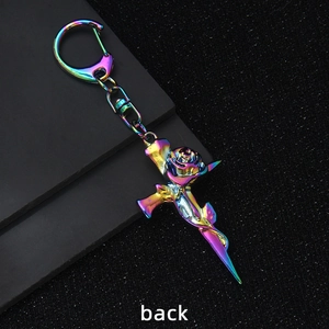 Iridescent plating rose and cross dagger keychain featuring colorful metallic finish