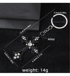 Gothic black alloy cross keychain with white rhinestones and detailed dimensions
