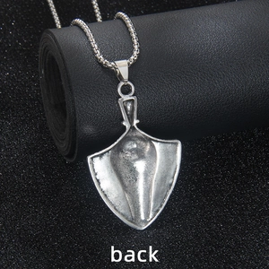 Back view of vintage silver stainless steel shield pendant with a sturdy box chain