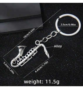 Detailed size specifications of the vintage silver saxophone musical instrument keychain
