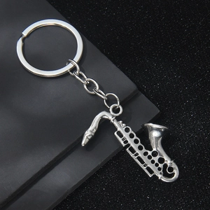 Silver vintage saxophone instrument keychain with classic metal keyring accessory