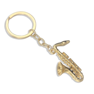 Golden saxophone musical instrument keychain with a polished metal finish on white background